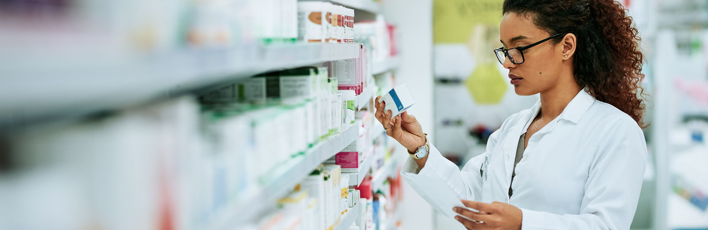 Pharmacist Technician Reviewing Prescription
