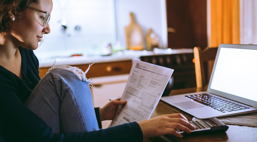 A student is accessing tax credit on her computer