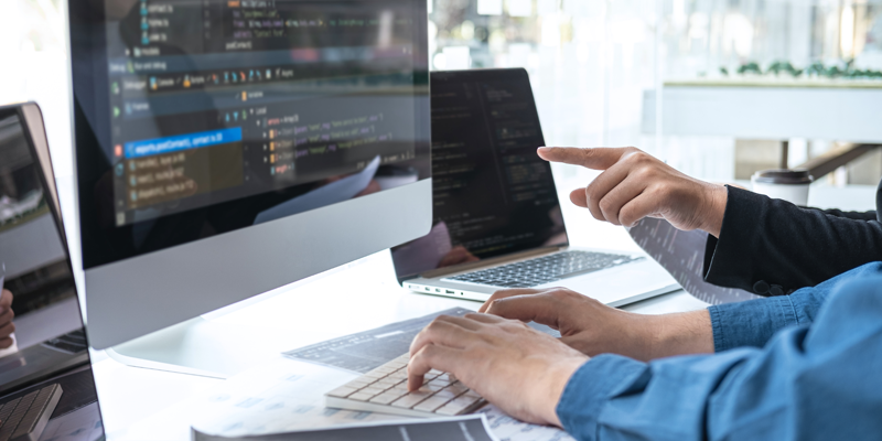 Hands appointing to a computer